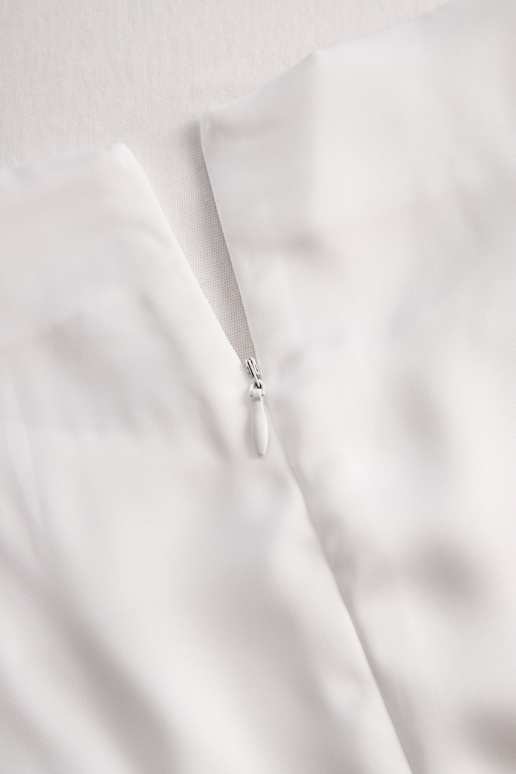 Elegant White Draped Top with Button Detail